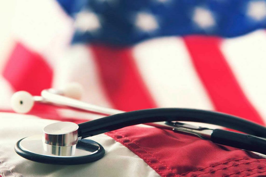stethoscope on top of flag