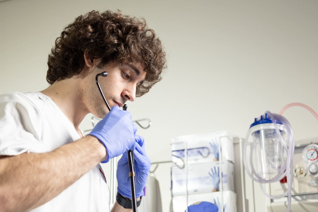 nurse checking heart