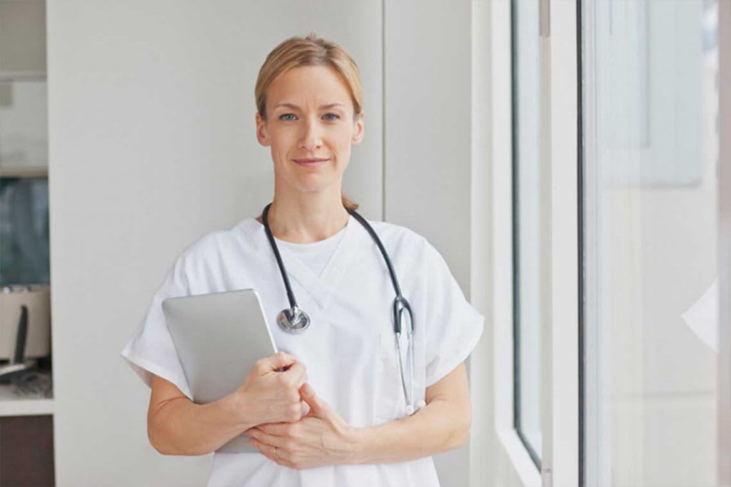 nurse holding clipboard