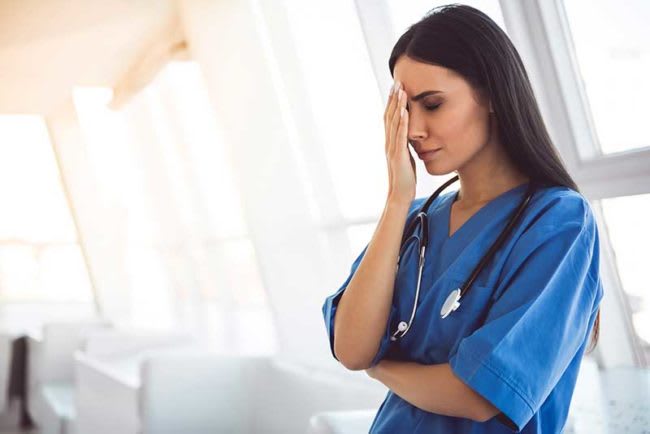 Nurse showing signs of stress