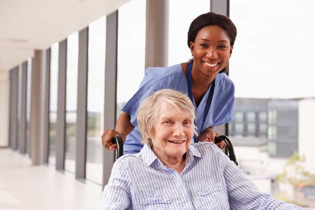 Nurse with patient in a hospital