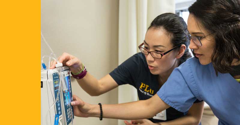 Pacific Lutheran University ABSN students looking at hospital equipment