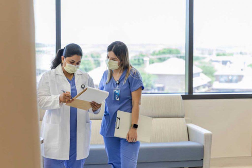 nurses with clipboards