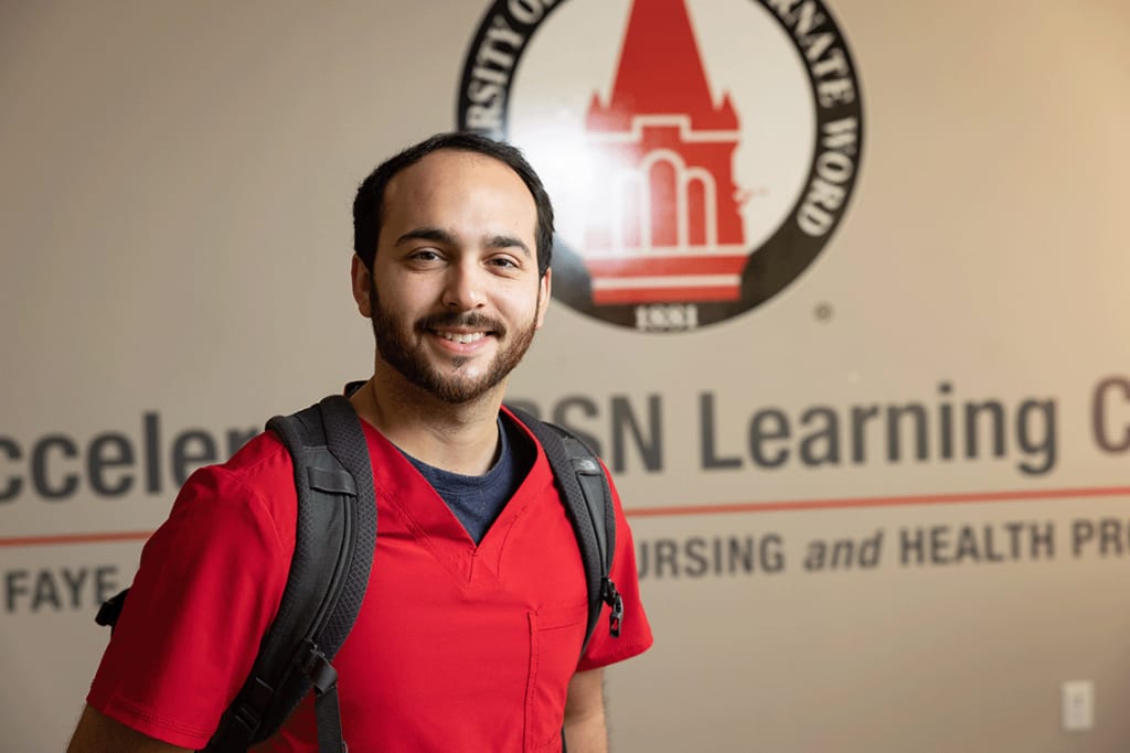 UIW student wearing backpack smiling