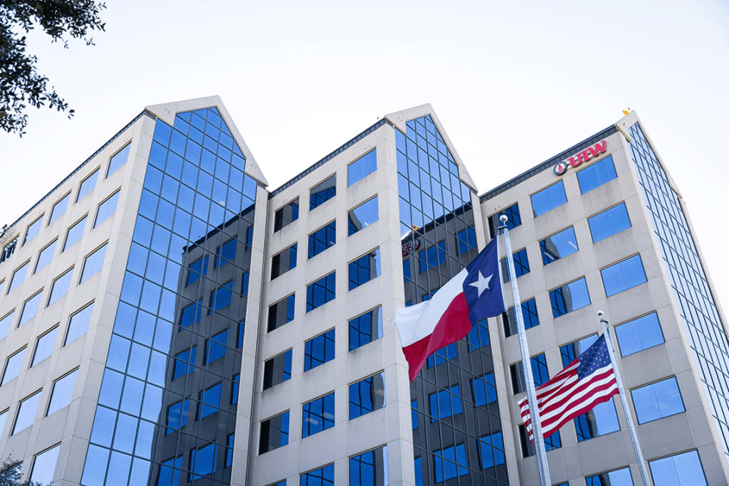 outside shot of buildings with UIW logo
