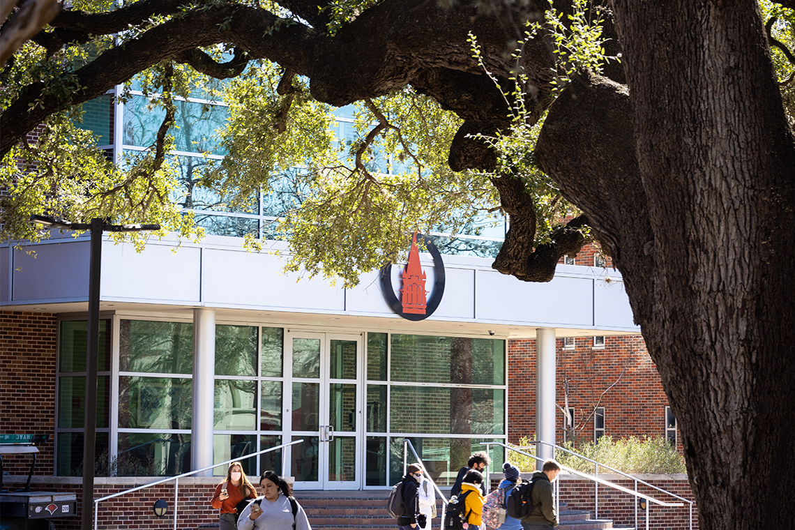 outside buildings on UIW campus with school logo