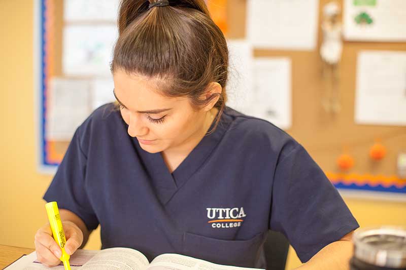 Utica nursing student studying