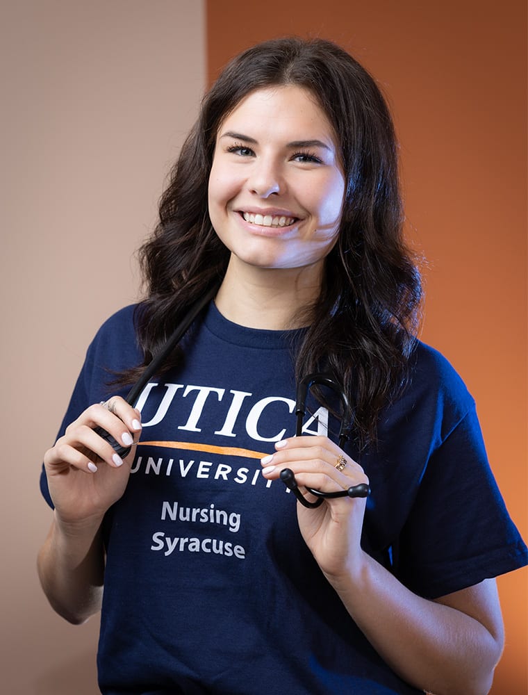 utica smiling nursing student