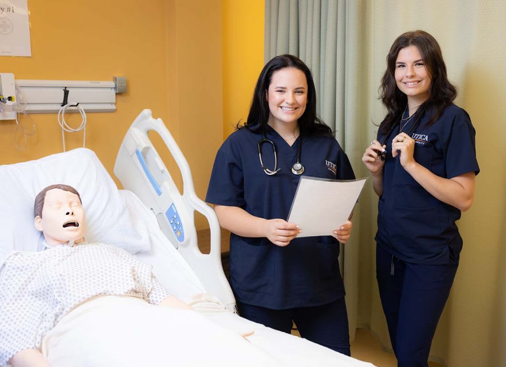 two nurses with patient