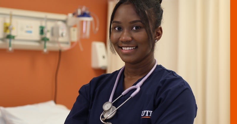 Utica ABSN student wearing stethoscope