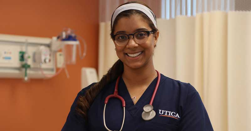 Utica ABSN student wearing stethoscope