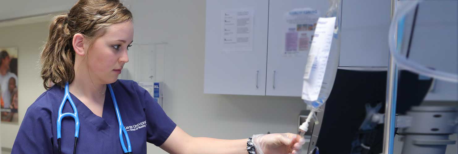 Lauren working in clinical setting