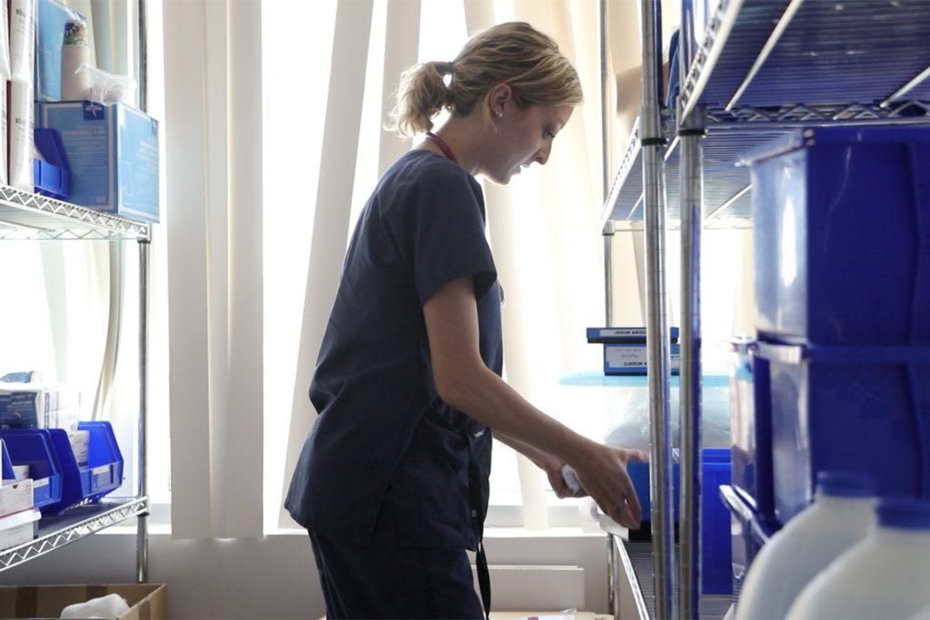 xavier absn student grabbing supplies