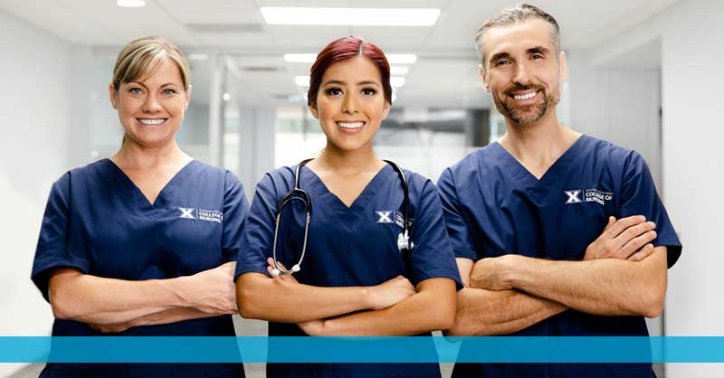 three Xavier ABSN students posing and smiling