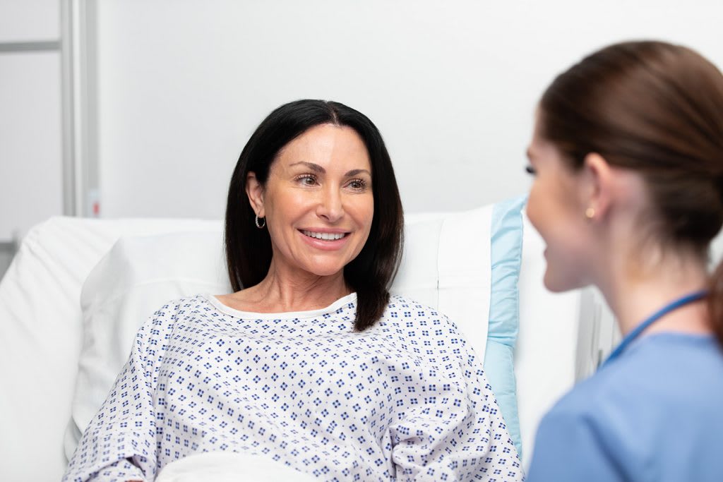 patient smiling at nurse