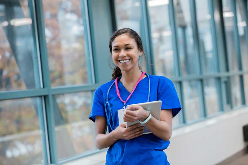 nurse walking to clinicals