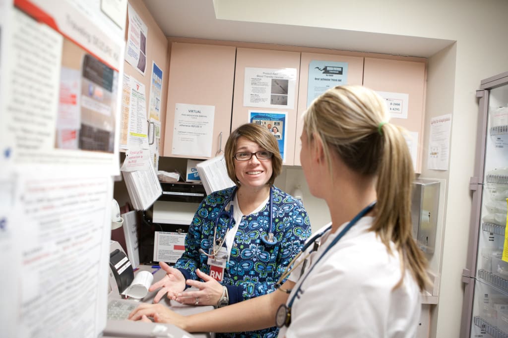 Two nurses talking