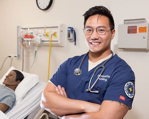 MQ smiling nurse in nursing simulation lab