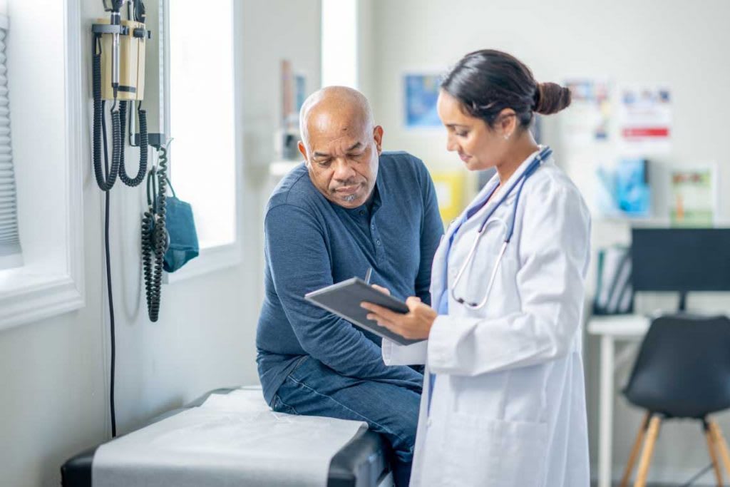 nurse talking with patient