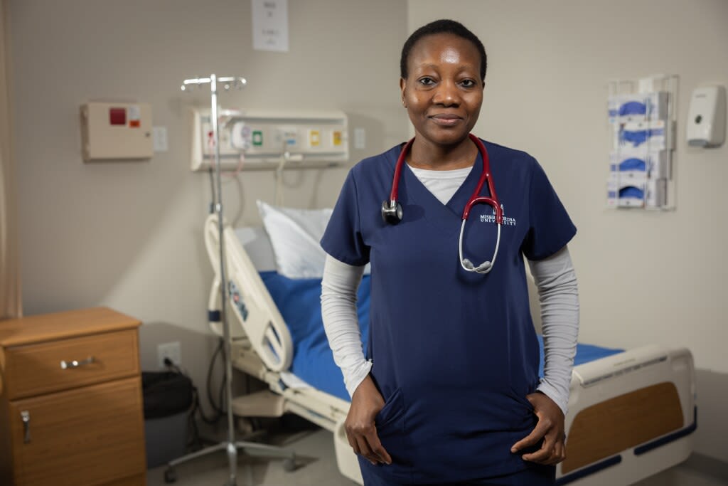 Misericordia nursing student posing for camera in sim lab