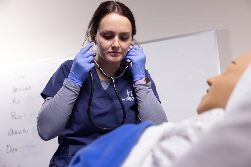 Misericordia nursing student using stethoscope