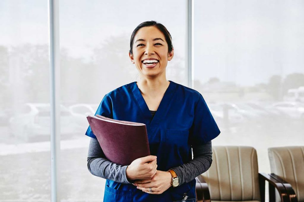 nurse smiling at camera