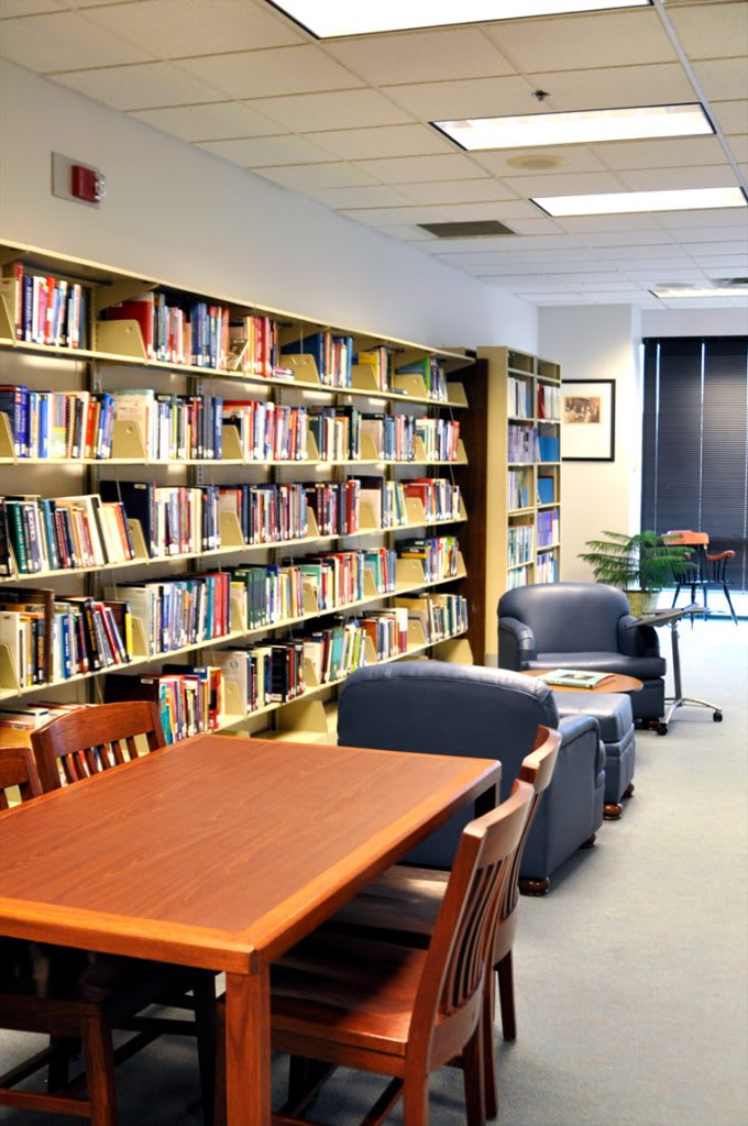 indoor library shelf of books