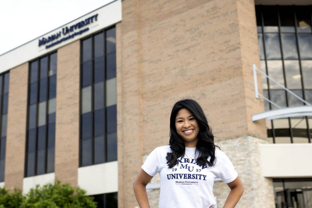girl-in-from-of-marian-building