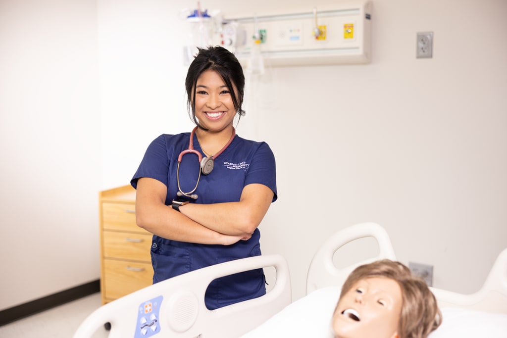 nurse with manikin