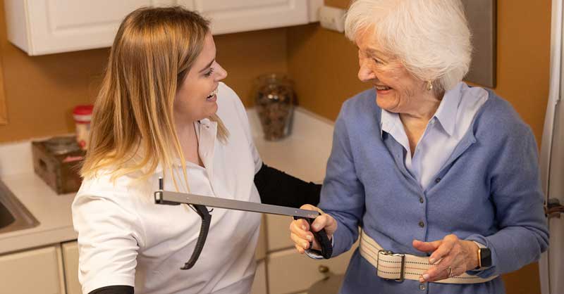 OT helping elderly patient