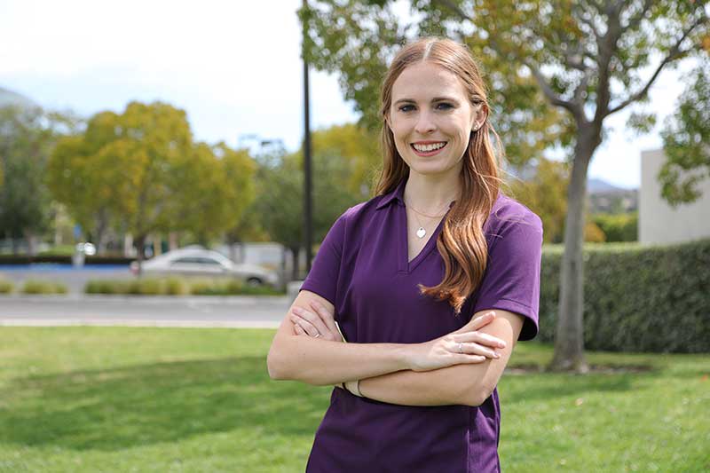 OT student standing outside smiling