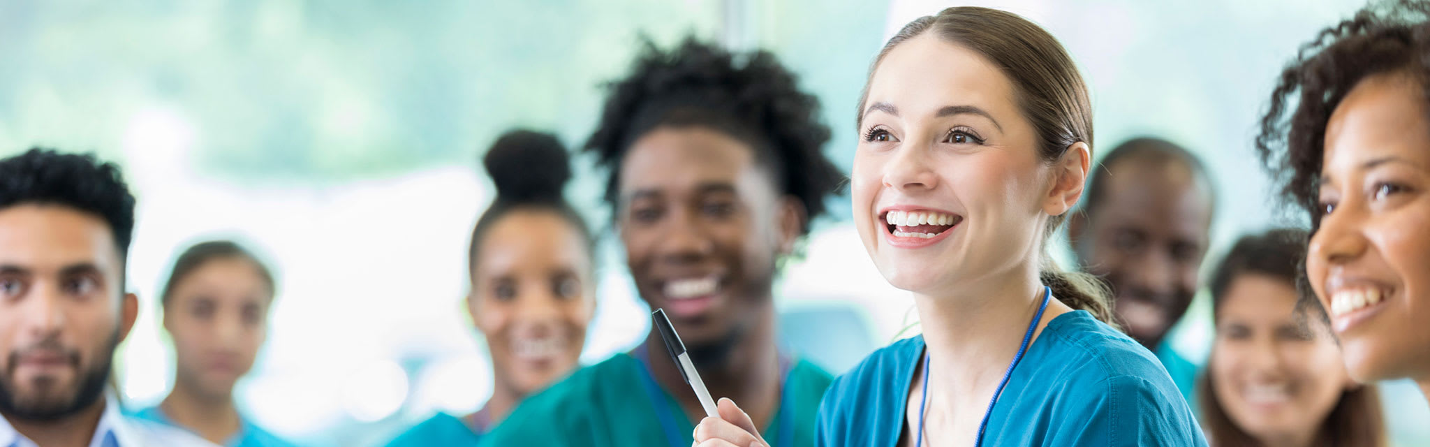 nurses sitting together in classroom