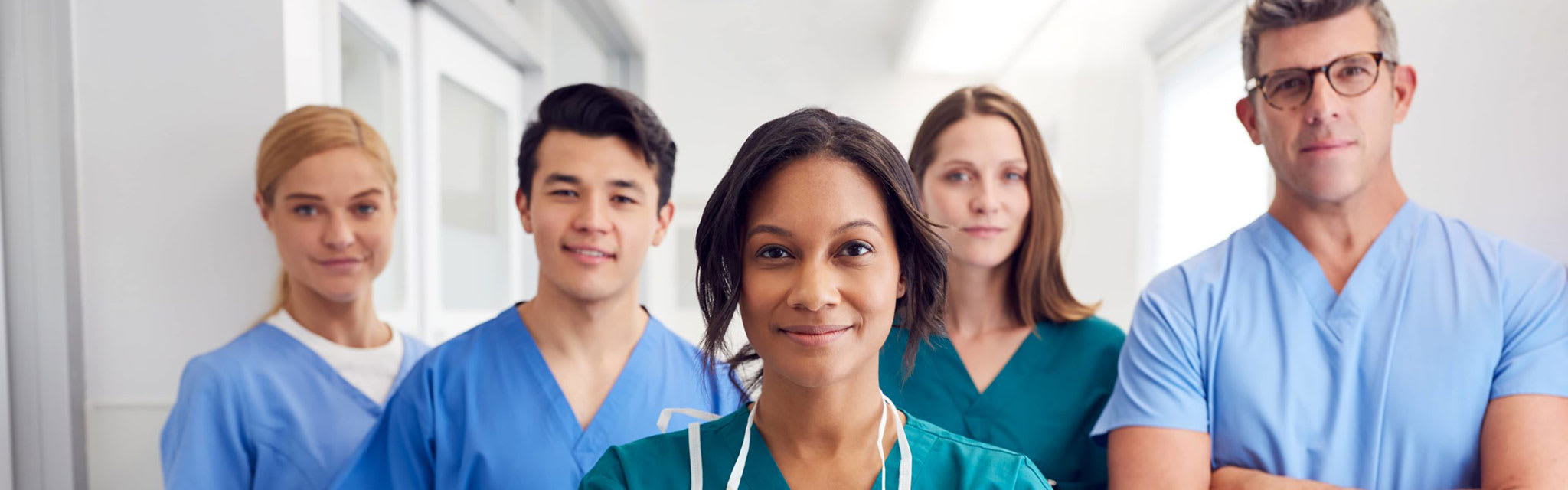 team of nurses standing and posing