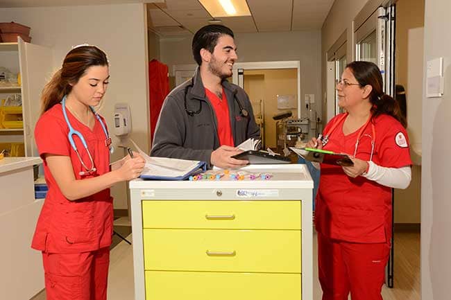 University of St. Thomas ABSN students working in hospital