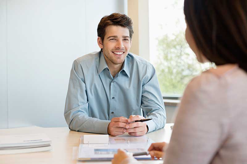 man sitting in interview