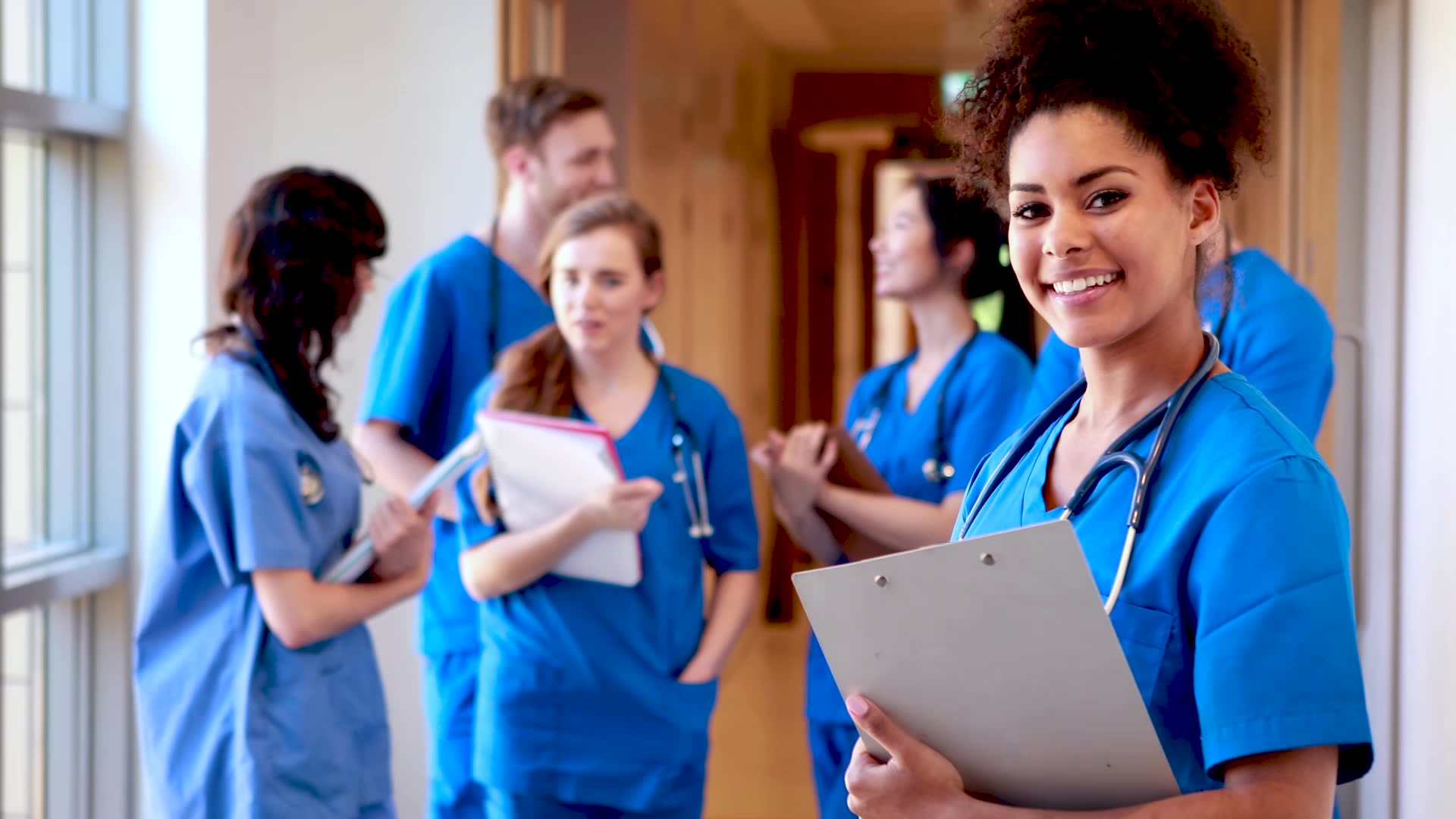 nursing students standing in the hallway