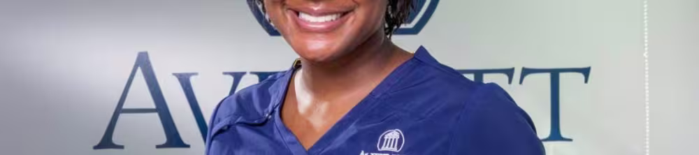 Averett nursing Student smiling in lobby