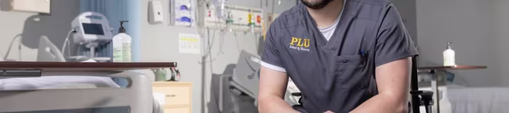 nursing student sitting down posing