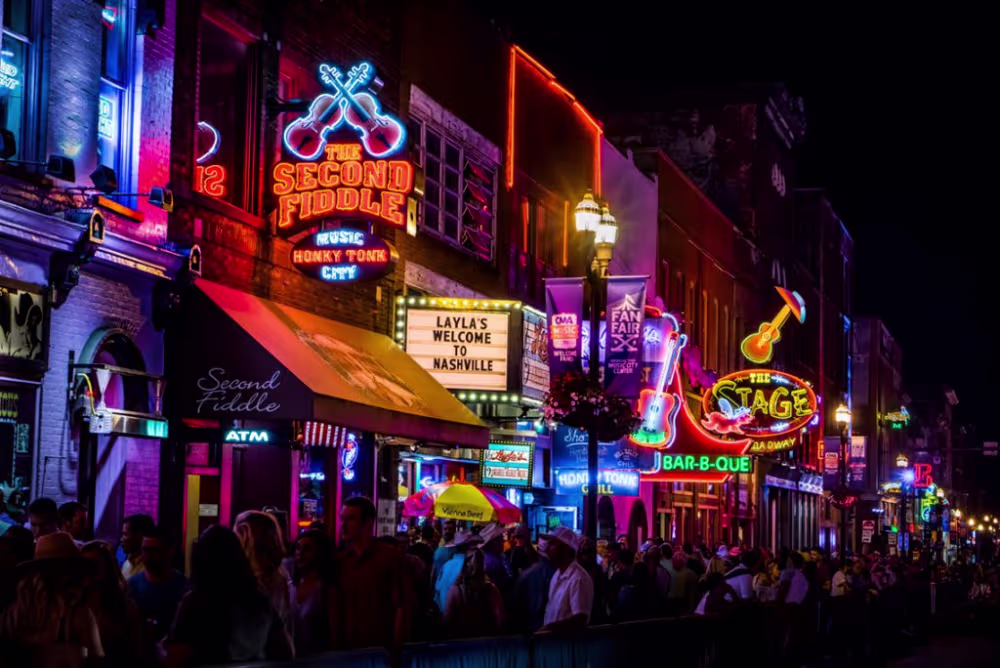 Outdoor night view of city streets with neon lights