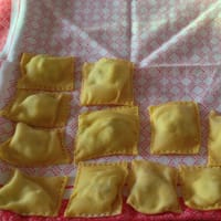 Ravioli with ricotta, radicchio and nuts with tomato sauce and bacon step 7