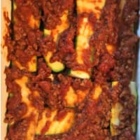 Zucchini flan, meat sauce with spices and smoked cheese step 6