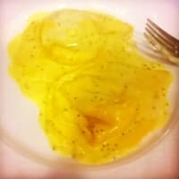 Tortelloni vegan pumpkin with saffron sauce and poppy seeds