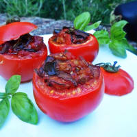 Tomates con la berenjena de asiento