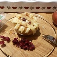 Basket of apple filling of dried cranberries