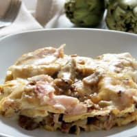 Lasagna with artichokes, mushrooms and ham