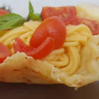 Basket of Parmesan and spaghetti