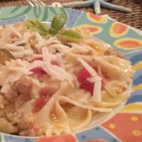Farfalle with sausage and the scents