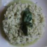 Green rice with mozzarella heart. A delicate dish