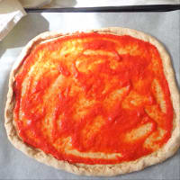 Full-length pizza with cottage cheese, cherry tomatoes and pumpkin flowers step 3