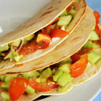 Tortillias with avocado, cucumber and tomatoes